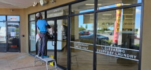 Vinyl Lettering Storefront Installation in Mobile