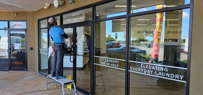 Vinyl Lettering Storefront Installation in Mobile