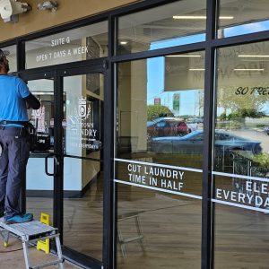 Vinyl Lettering Storefront Installation in Mobile